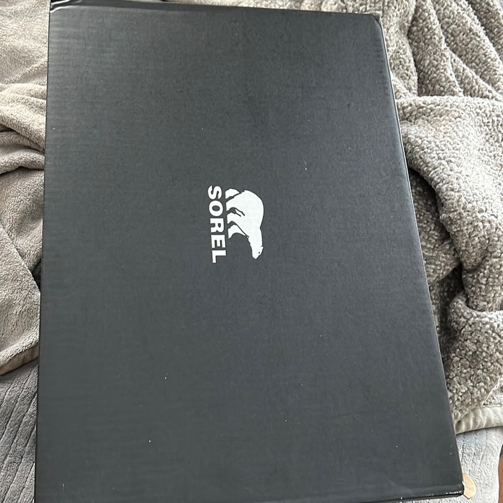 Sorel boots never worn, box , tags attached